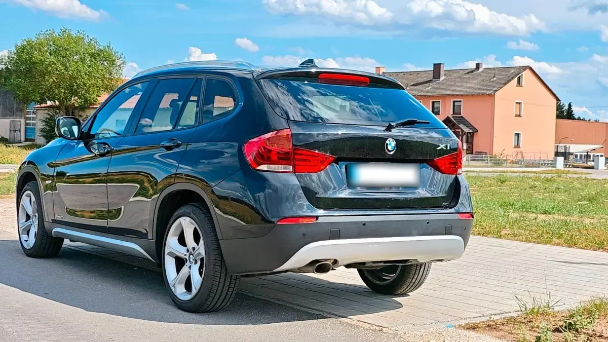 Gebraucht BMW X1 Sport Line 177 PS (130 kW) 2011 Schwarz SUV