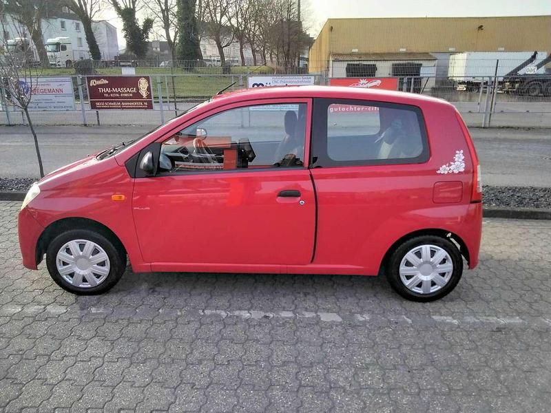 Gebraucht Daihatsu Cuore Plus 58 PS (42 kW) 2006 Rot Kleinwagen