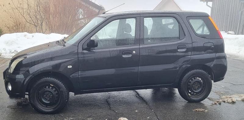 Schwarz Gebraucht 2006 Subaru Justy Kleinwagen | 3.250 € - Bild 1/4