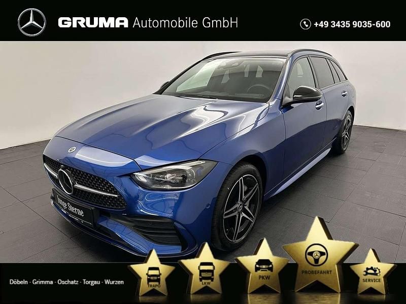 lack spektralblau Gebraucht 2024 Mercedes C300e AMG Kombi | 65.430 € - Bild 1/4