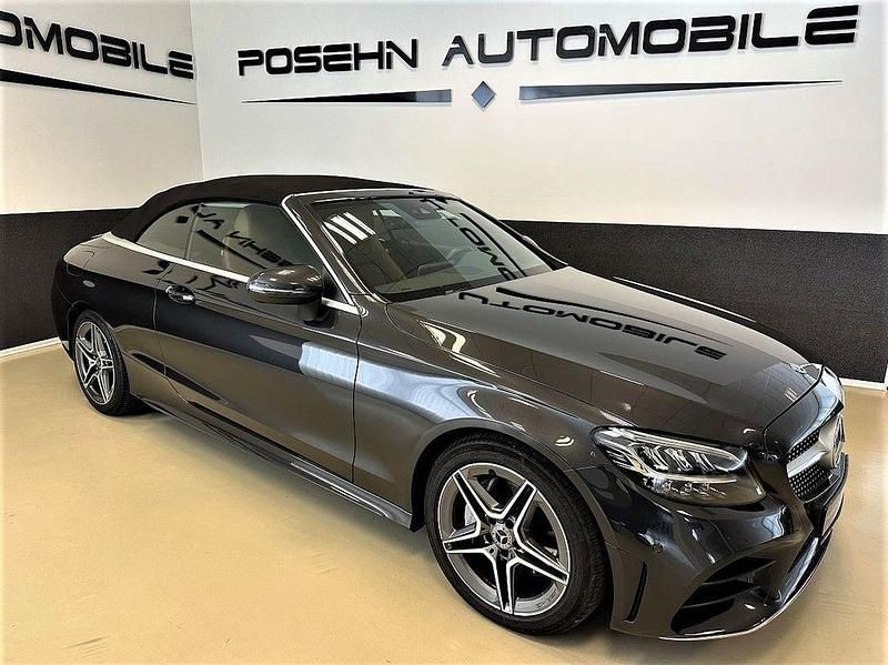 Grafitgrau lack Gebraucht 2020 Mercedes C180 AMG line Cabrio | 30.450 € (Fairer Preis) - Bild 1/4