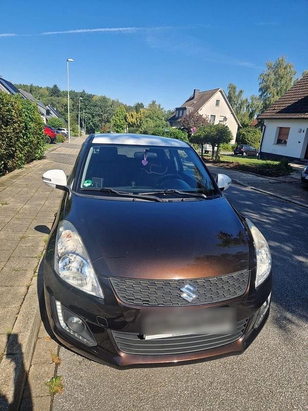 Braun Gebraucht 2015 Suzuki Swift Comfort Kleinwagen | 7.600 € (Fairer Preis) - Bild 1/4