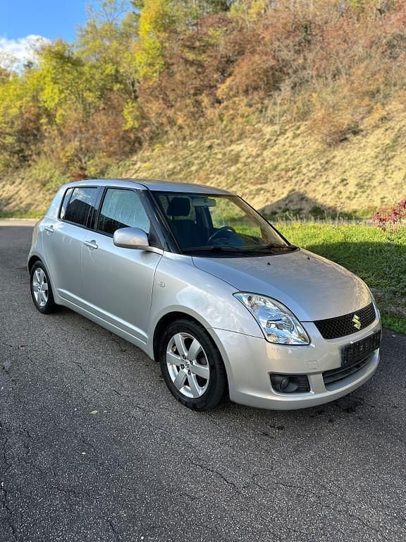 Silber Gebraucht 2009 Suzuki Swift Limousine | 2.999 € (Fairer Preis) - Bild 1/4