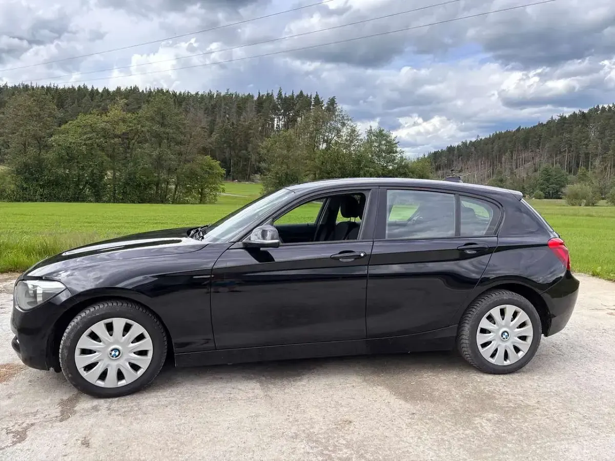 Gebraucht BMW 114 102 PS (75 kW) 2012 Schwarz Kleinwagen