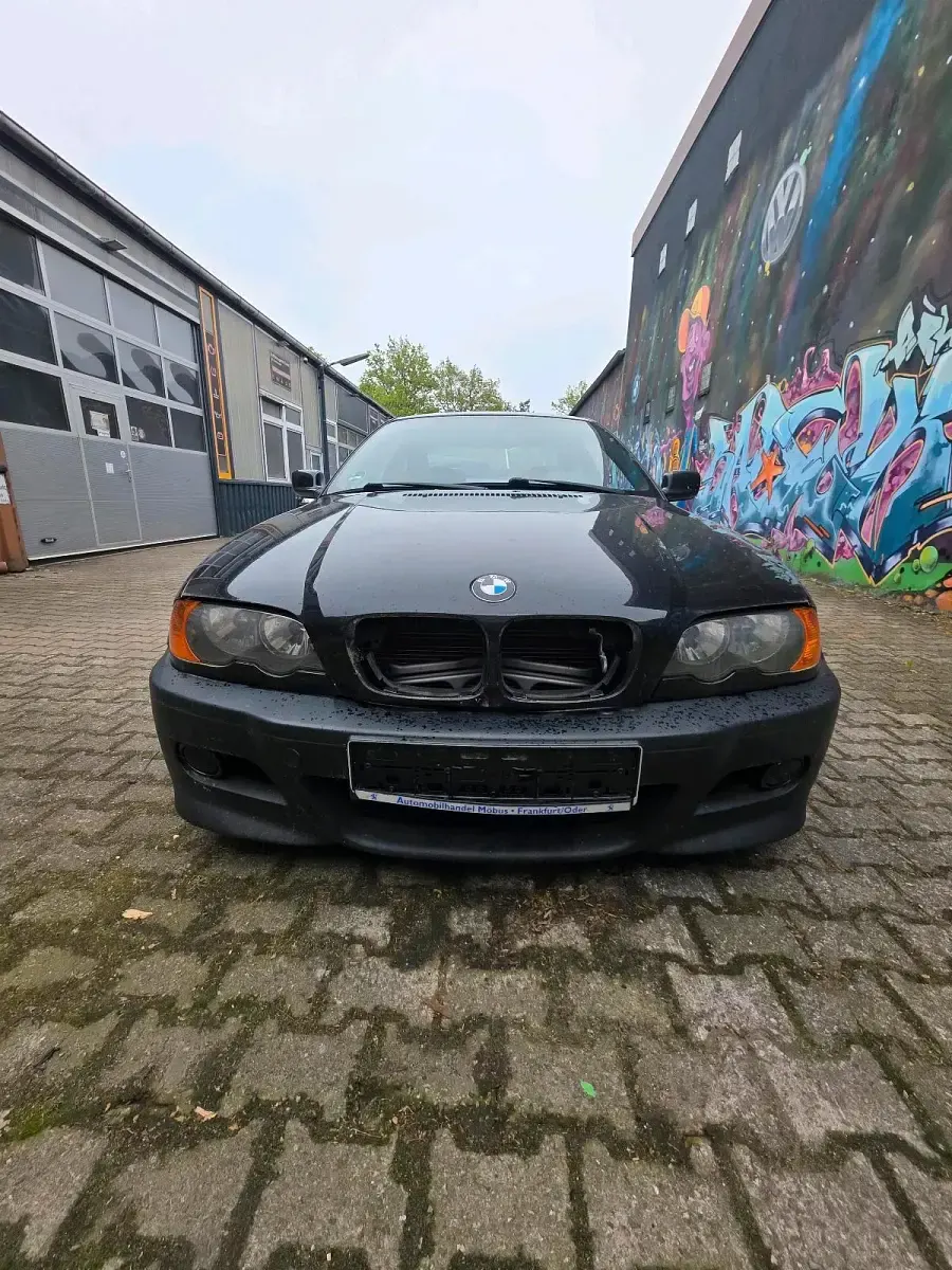 Używany BMW 323 Basis 170 KM (125 kW) 2000 Czarny Coupe