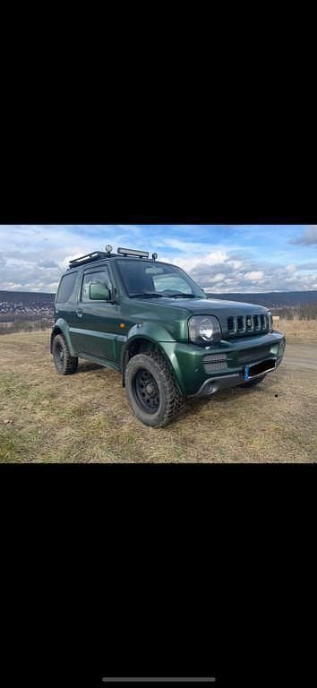 Grün Gebraucht 2012 Suzuki Jimny Club SUV | 15.500 € (Teuer) - Bild 1/4
