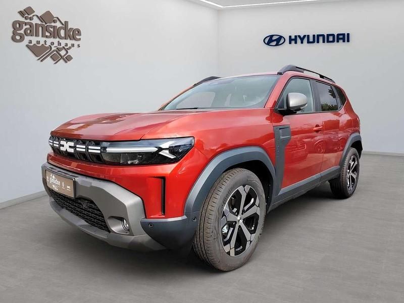 Braun Neu 2025 Dacia Duster Expression SUV | 27.490 € (Etwas zu teuer) - Bild 1/3