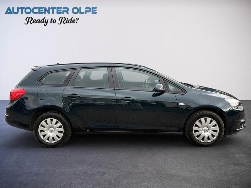 Gebraucht Opel Astra 110 PS (80 kW) 2015 Grün Kombi