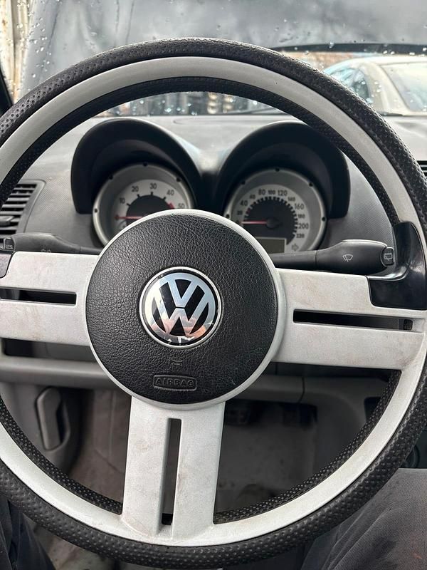 Gebraucht VW Lupo 61 PS (44 kW) 1999 Schwarz Kleinwagen