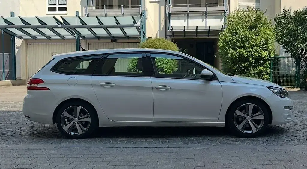 Gebraucht Peugeot 308 SW Access 116 PS (85 kW) 2014 Weiß Kombi