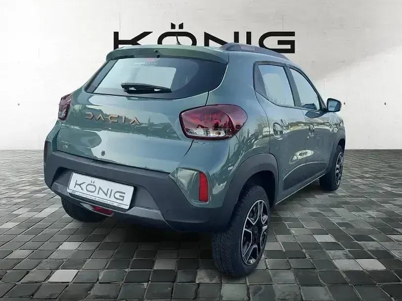 Gebraucht Dacia Spring Extreme 47 kW (65 PS) 2023 Grün "flechtengrau" Kleinwagen