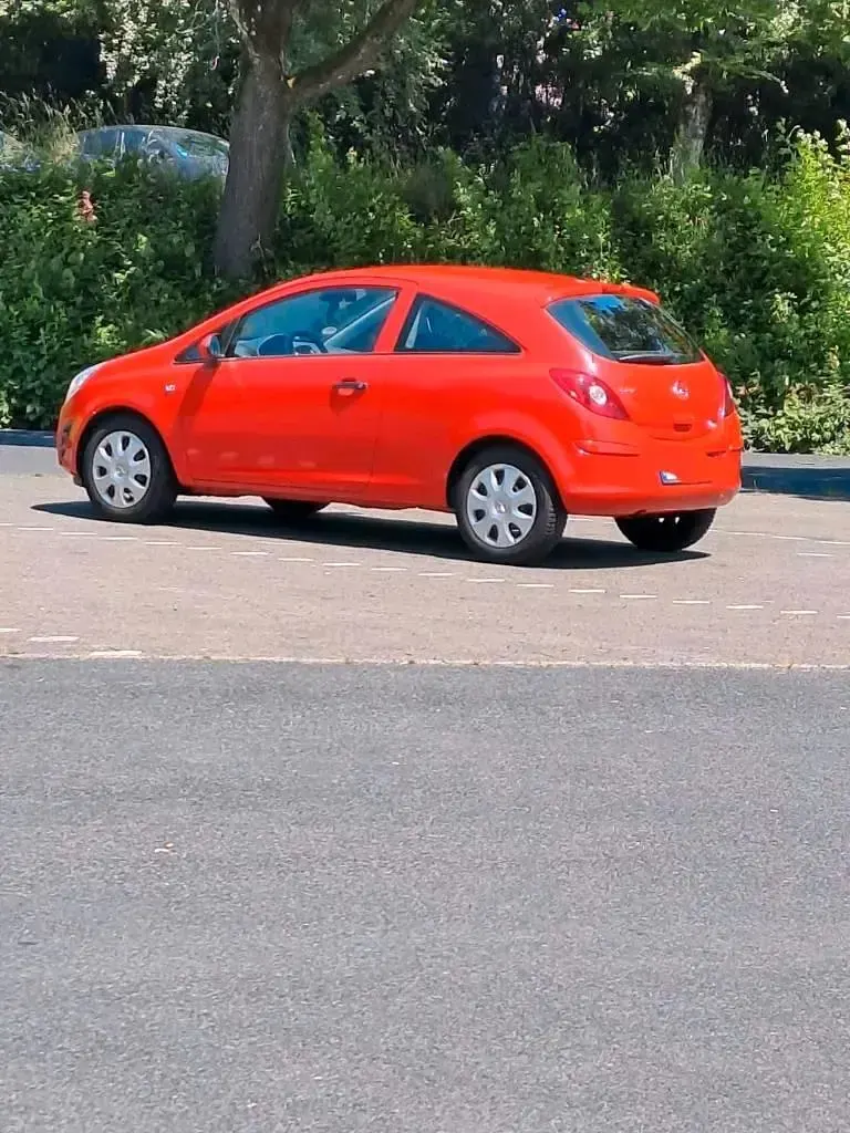 Gebraucht Opel Corsa 69 PS (50 kW) 2014 Rot Kleinwagen