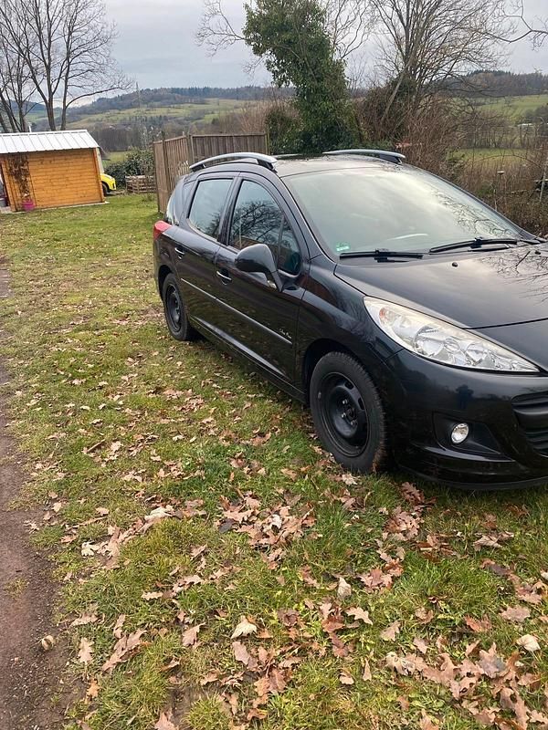 Gebraucht Peugeot 207 95 PS (69 kW) 2011 Schwarz Kombi