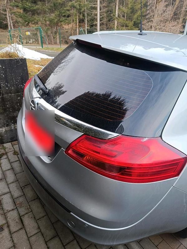Second-hand Opel Insignia 160 CP (117 kW) 2011 Argintiu Break