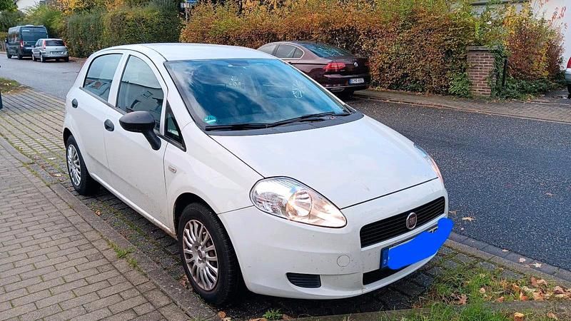Weiß Gebraucht 2011 Fiat Grande Punto Kleinwagen | 2.875 € (Fairer Preis) - Bild 1/4
