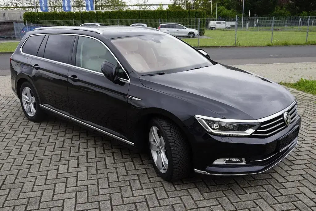 Używany VW Passat Highline 239 KM (175 kW) 2014 Czarny Kombi