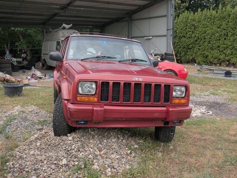 Rot Gebraucht 2000 Jeep Cherokee SUV | 3.500 € - Bild 1/4
