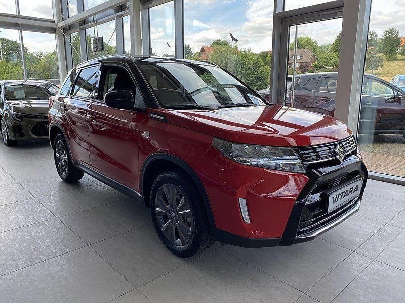 Bright red/cosmic black pearl Gebraucht 2025 Suzuki Vitara Comfort SUV | 26.900 € (Fairer Preis) - Bild 1/4