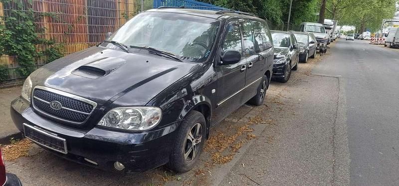 Midnight black Gebraucht 2004 Kia Carnival Van / Kleinbus | 1.799 € (Fairer Preis) - Bild 1/4