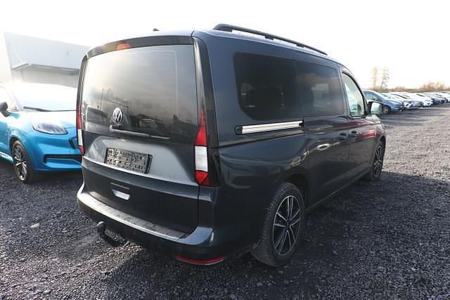 Starlight blue metallic starlight blue metallic Gebraucht 2024 VW Caddy Maxi S Van / Kleinbus | 33.551 € (Fairer Preis) - Bild 1/4