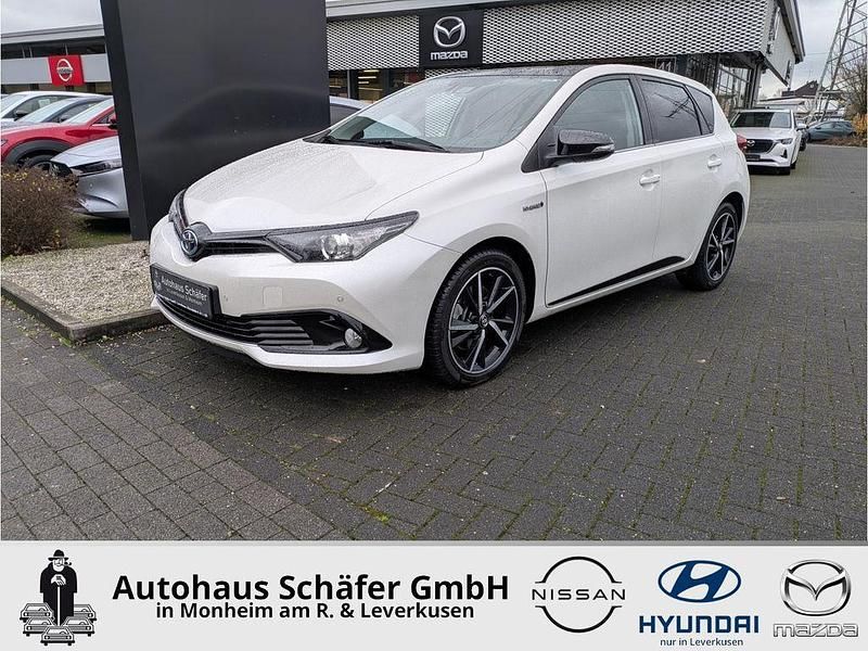 White pearl cs (070)/ black mi Gebraucht 2017 Toyota Auris Hybrid Style Limousine | 14.485 € (Fairer Preis) - Bild 1/4