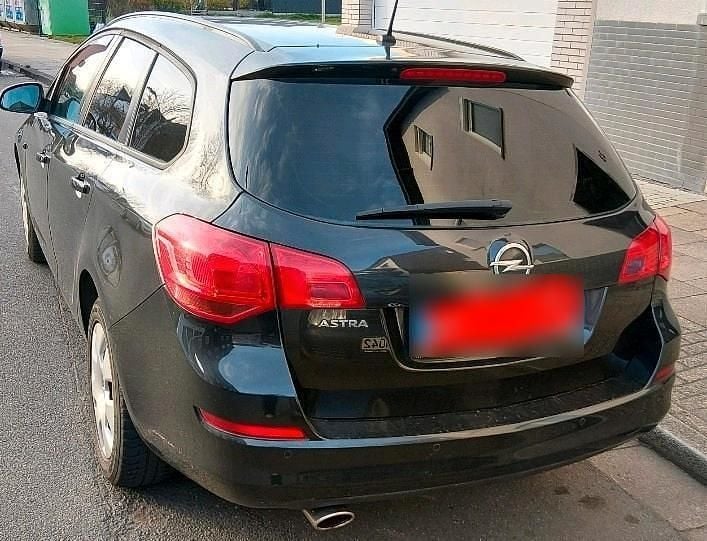 Gebraucht Opel Astra 120 PS (88 kW) 2012 Schwarz Kombi