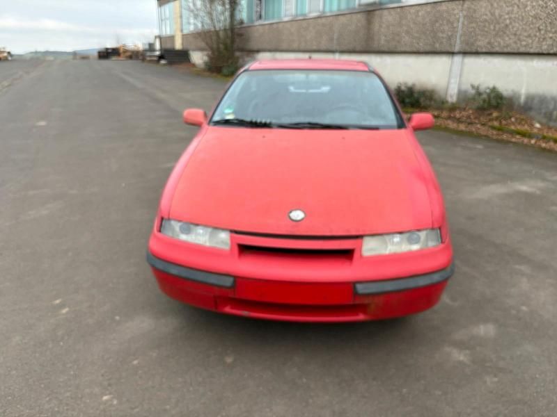 Rot Gebraucht 1991 Opel Calibra Coupé | 1.495 € - Bild 1/4