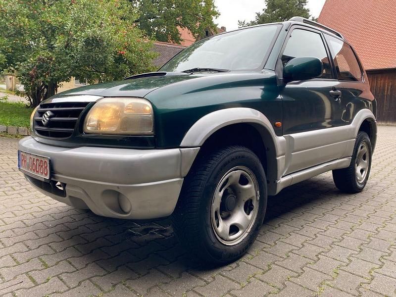 Grün Gebraucht 2003 Suzuki Grand Vitara Comfort SUV | 5.999 € (Teuer) - Bild 1/4