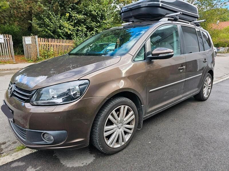 Braun Gebraucht 2011 VW Touran Van / Kleinbus | 6.999 € - Bild 1/4
