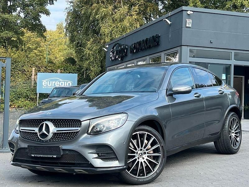 Grau Gebraucht 2018 Mercedes GLC220 AMG line Coupé | 25.890 € (Guter Preis) - Bild 1/4