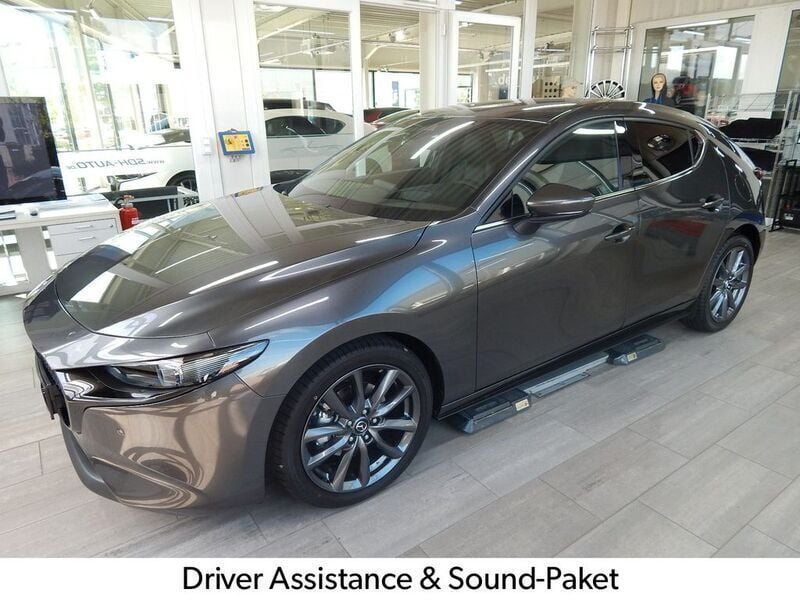 Grau Neu 2025 Mazda 3 Exclusive Limousine | 26.990 € (Fairer Preis) - Bild 1/4