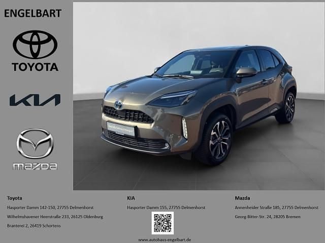 Manganbronze metallic Gebraucht 2023 Toyota Yaris Hybrid Connect Style SUV | 24.450 € (Fairer Preis) - Bild 1/4