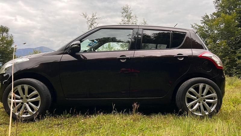 Braun Gebraucht 2013 Suzuki Swift Limited Kleinwagen | 5.800 € (Fairer Preis) - Bild 1/4