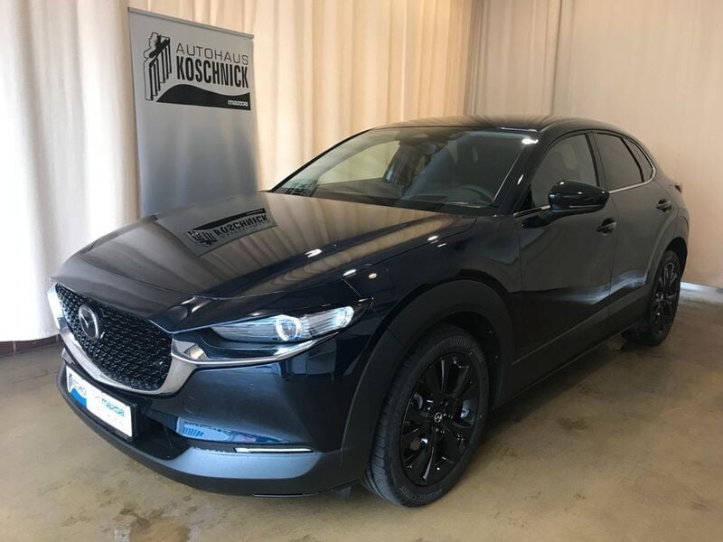 Deep crystal blue Gebraucht 2024 Mazda CX-30 Homura-Line SUV | 26.900 € - Bild 1/4