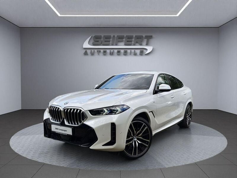 Mineralweiss metallic Gebraucht 2024 BMW X6 M Sport SUV | 93.900 € (Fairer Preis) - Bild 1/4