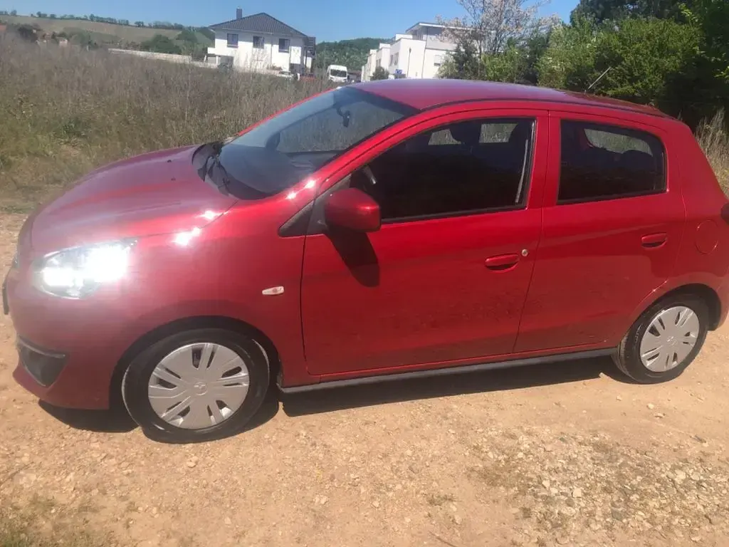 Gebraucht Mitsubishi Space Star Diamant Edition 71 PS (52 kW) 2016 Rot Kleinwagen