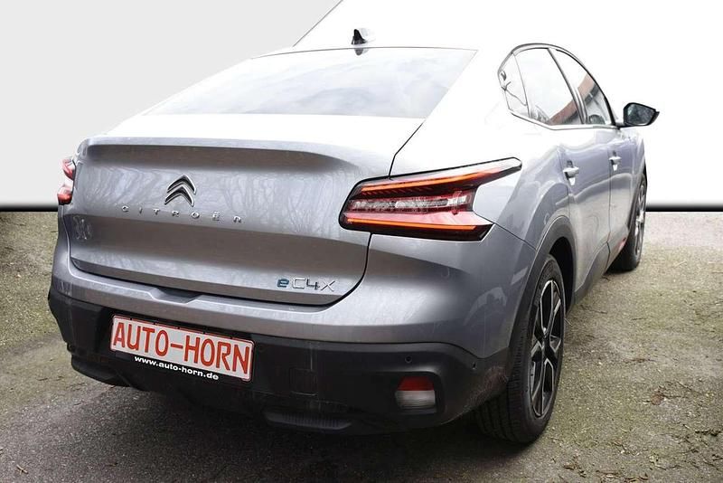 Gebraucht Citroën e-C4 Shine 100 kW (136 PS) 2023 Stahlgrau metallic Limousine