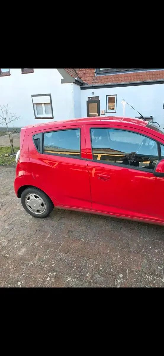 Używany Chevrolet Spark 60 KM (44 kW) 2011 Czerwony Hatchback