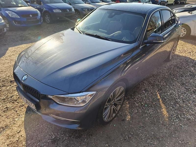 Gebraucht BMW 318 143 PS (105 kW) 2015 Mineralgrau metallic Limousine