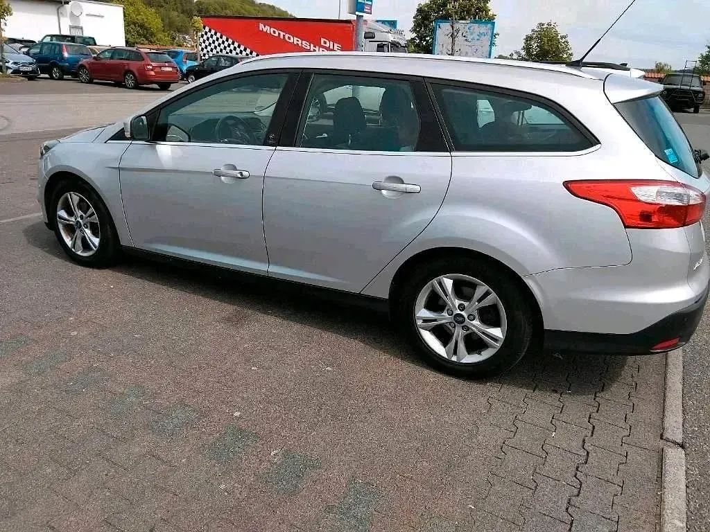 Używany Ford Focus 105 KM (77 kW) 2012 Szary Kombi