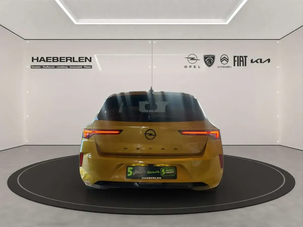 Gebraucht Opel Astra 131 PS (96 kW) 2024 Lackierung amber yellow/typ aussenverkle (metallic) Limousine
