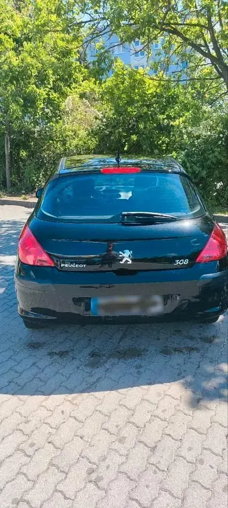 Gebraucht Peugeot 308 98 PS (72 kW) 2010 Schwarz Kleinwagen
