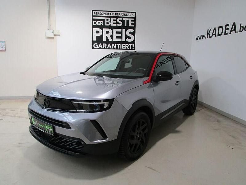 Gebraucht Opel Mokka 131 PS (96 kW) 2023 Kontrast grau/quarz silber SUV