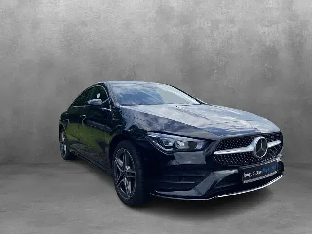 Gebraucht Mercedes CLA250e AMG line 218 PS (160 kW) 2023 Metalliclack kosmosschwarz Limousine