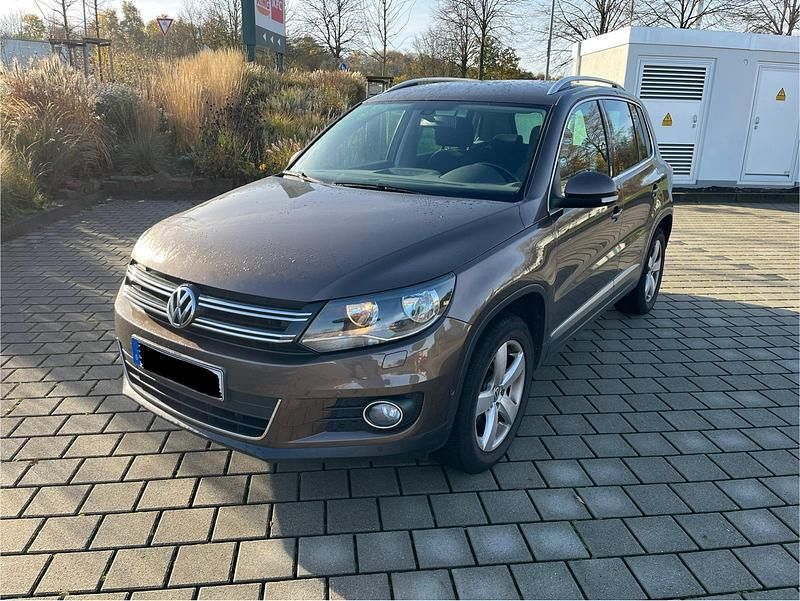 Braun Gebraucht 2013 VW Tiguan Sport SUV | 7.900 € (Superpreis) - Bild 1/4