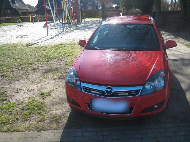 Second-hand Opel Astra 116 CP (85 kW) 2012 Roșu Break