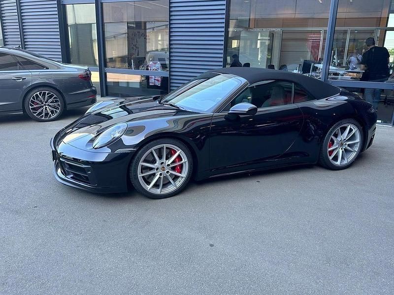 Schwarz Gebraucht 2024 Porsche 911 Carrera GTS Cabrio | 171.500 € (Fairer Preis) - Bild 1/4
