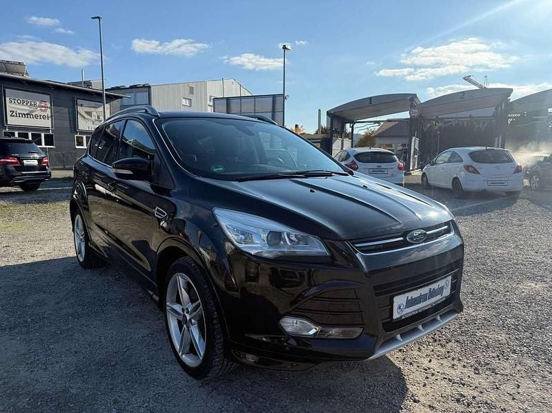 Pantherschwarz metallic Gebraucht 2014 Ford Kuga Individual SUV | 8.950 € (Superpreis) - Bild 1/4