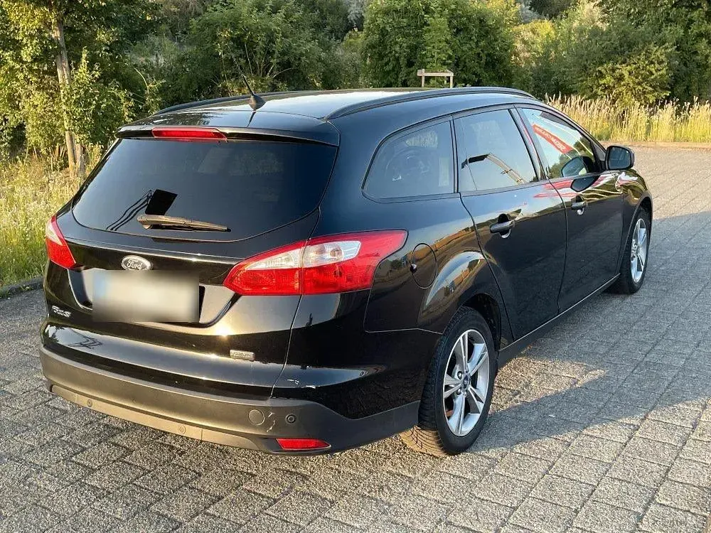 Gebraucht Ford Focus Champions Edition 125 PS (91 kW) 2013 Schwarz Kombi