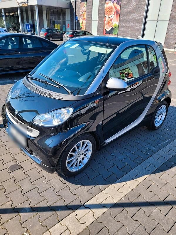 Schwarz Gebraucht 2011 Smart ForTwo Coupé Kleinwagen | 3.300 € - Bild 1/4